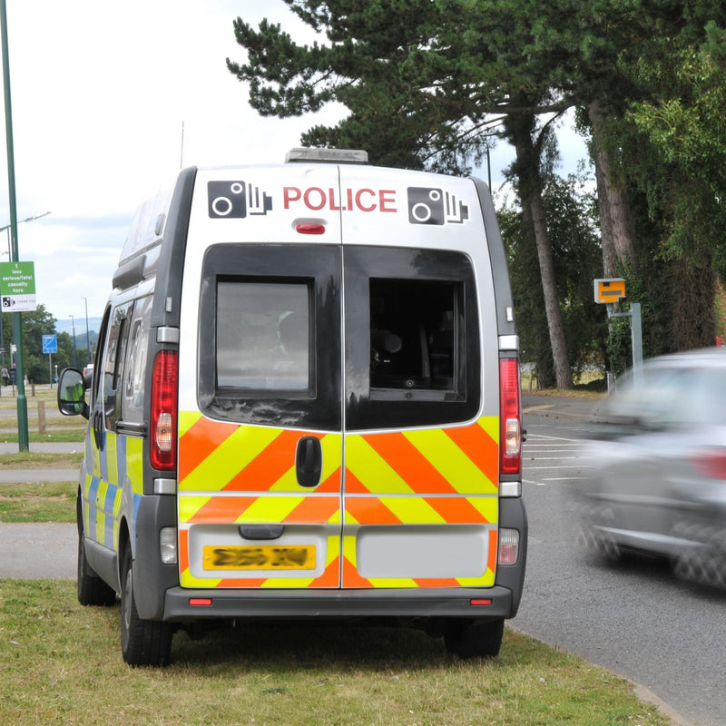 police mobile camera van with gatso speed camera in the background
